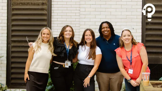 Packback team members collaborating during a company retreat, representing educators, engineers, designers, and strategists working together.